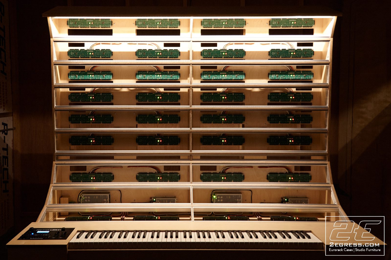 Altar synth desk | three-quarter view, full eurorack case wall | 2Egress