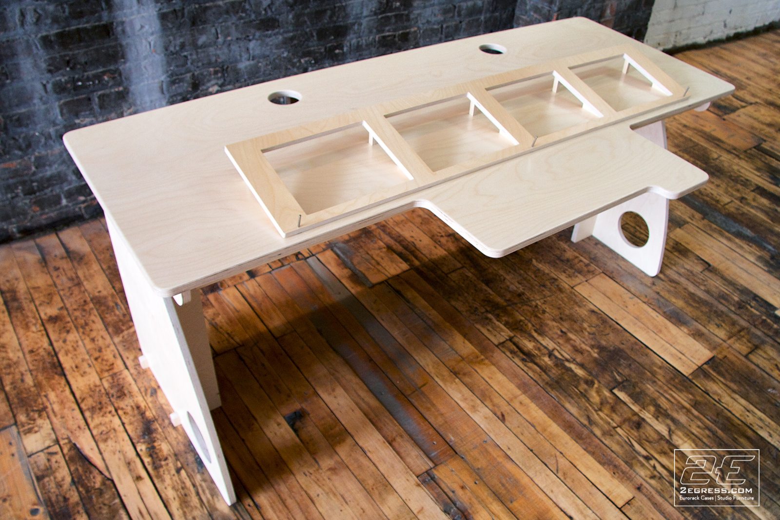 Controlfreak for Avid Artist desk | angled three-quarter view of the module bay insert | 2Egress