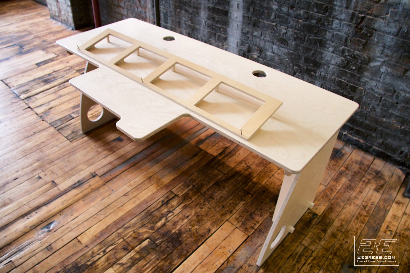 Controlfreak for Avid Artist desk | angled view showing the curved leg cutout | 2Egress