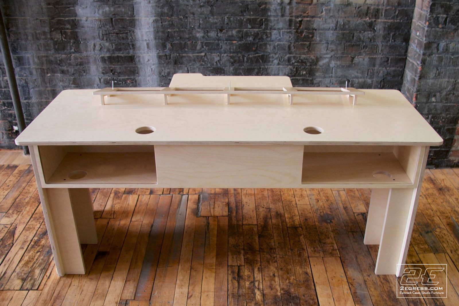 Controlfreak for Avid Artist desk | front view with the module bay frame resting on the desktop | 2Egress