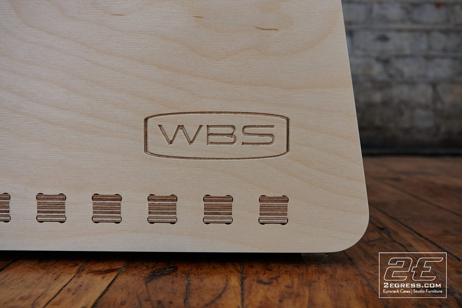 Dauntless Slant Rack Series | close detail of the engraved WBS logo and vent slots | 2Egress