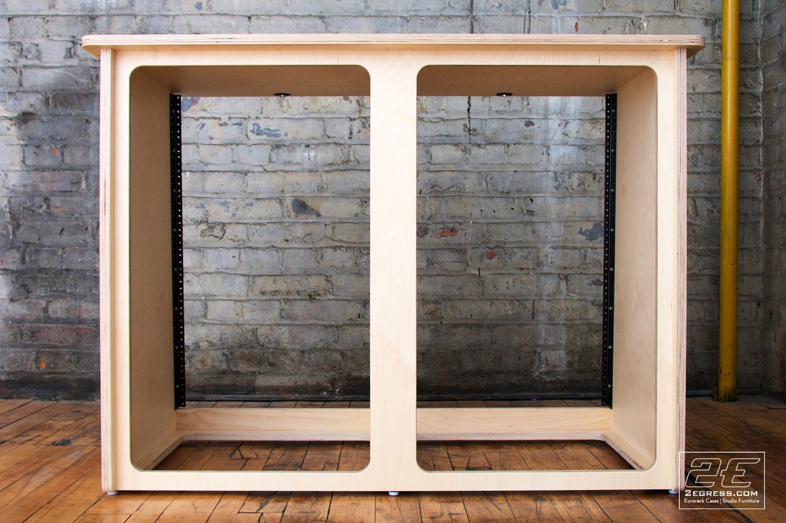 Double Bay Rack | 16U, natural birch finish, straight-on front view of the two open bays | 2Egress