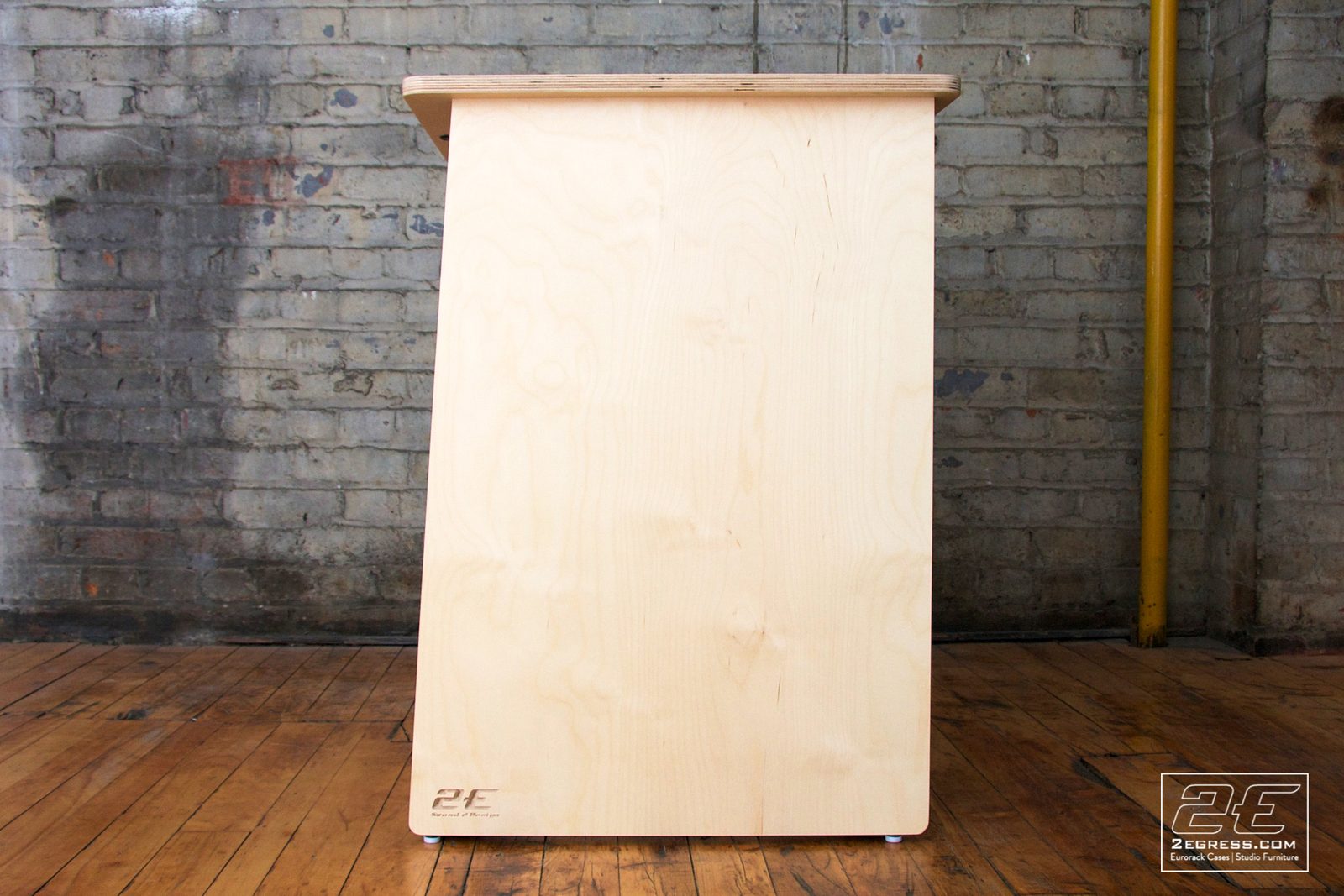 Double Bay Rack | 16U, natural birch finish, side profile view of the tapered panel with the 2Egress maker's mark | 2Egress