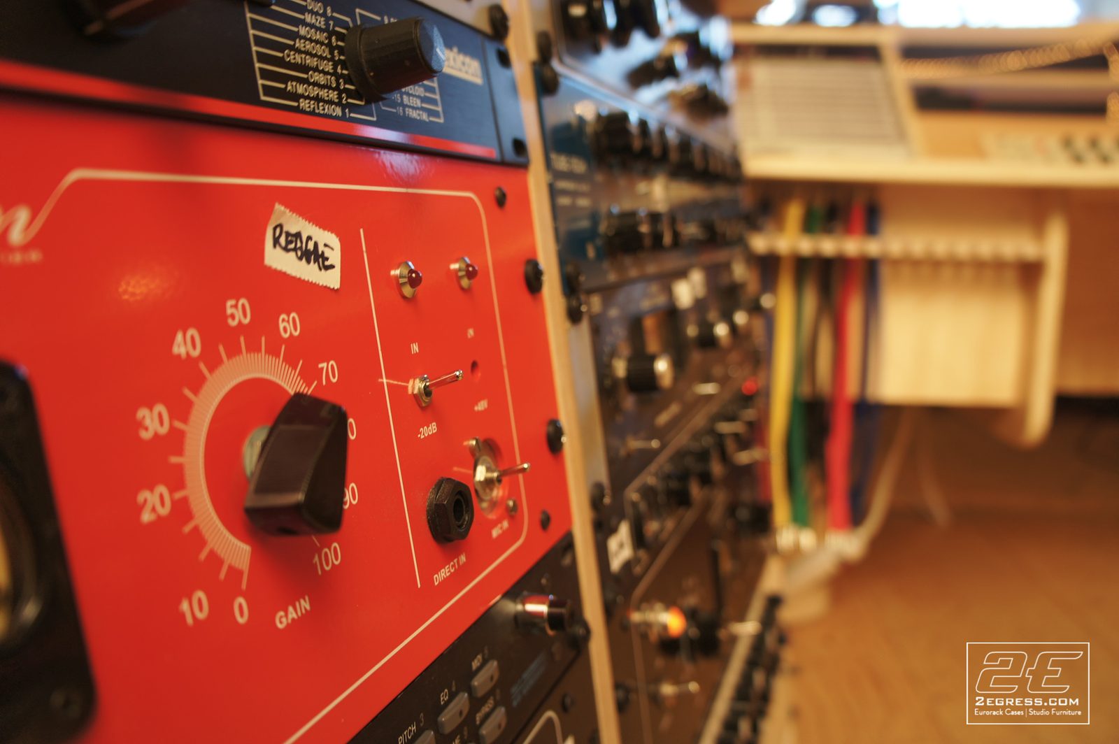 Double Bay Rack | in Damian Taylor's studio, close-up of a red rack-mounted preamp panel | 2Egress