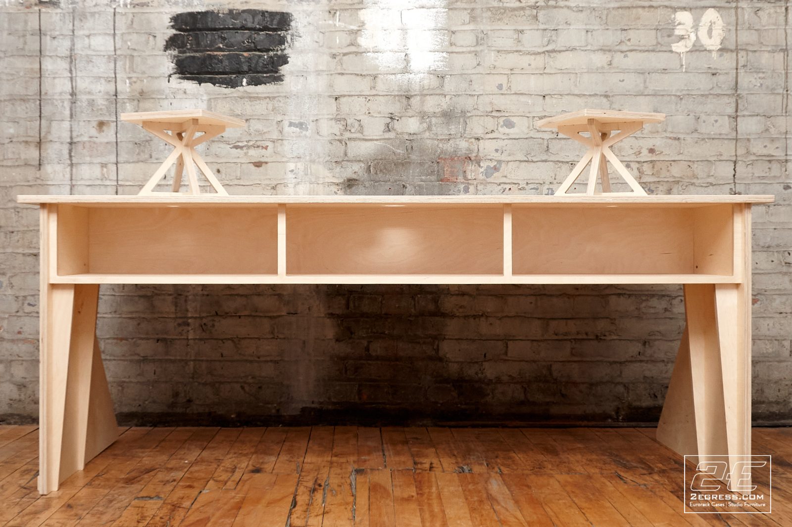 Facet desk | front view showing the open cubby shelving beneath the desktop | 2Egress
