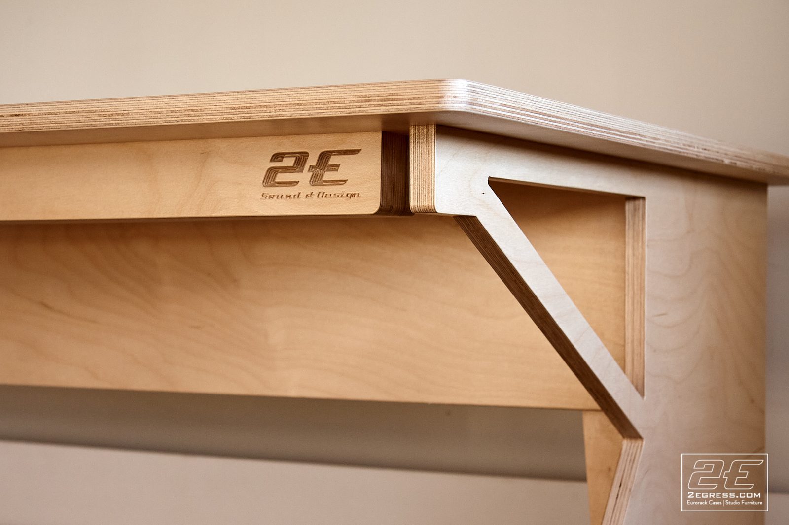 Facet desk | close detail of the corner joinery with engraved 2Egress logo | 2Egress