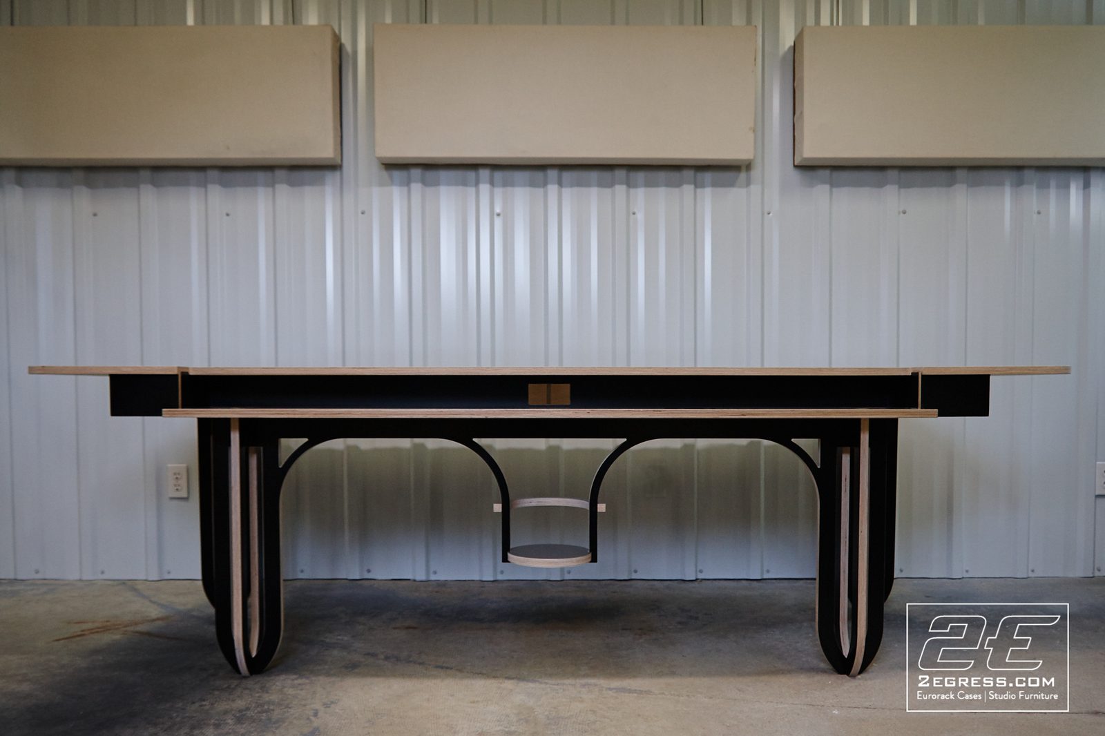 Luna studio desk | front view with arched leg design | 2Egress