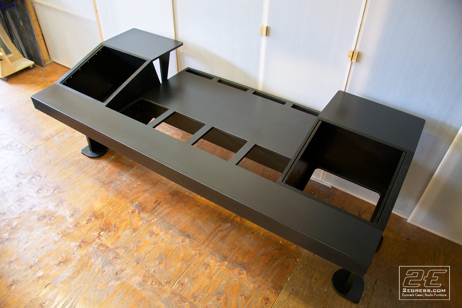 Stealth for Avid System 5 desk | overhead angled view of the rack bays and monitor cutouts | 2Egress