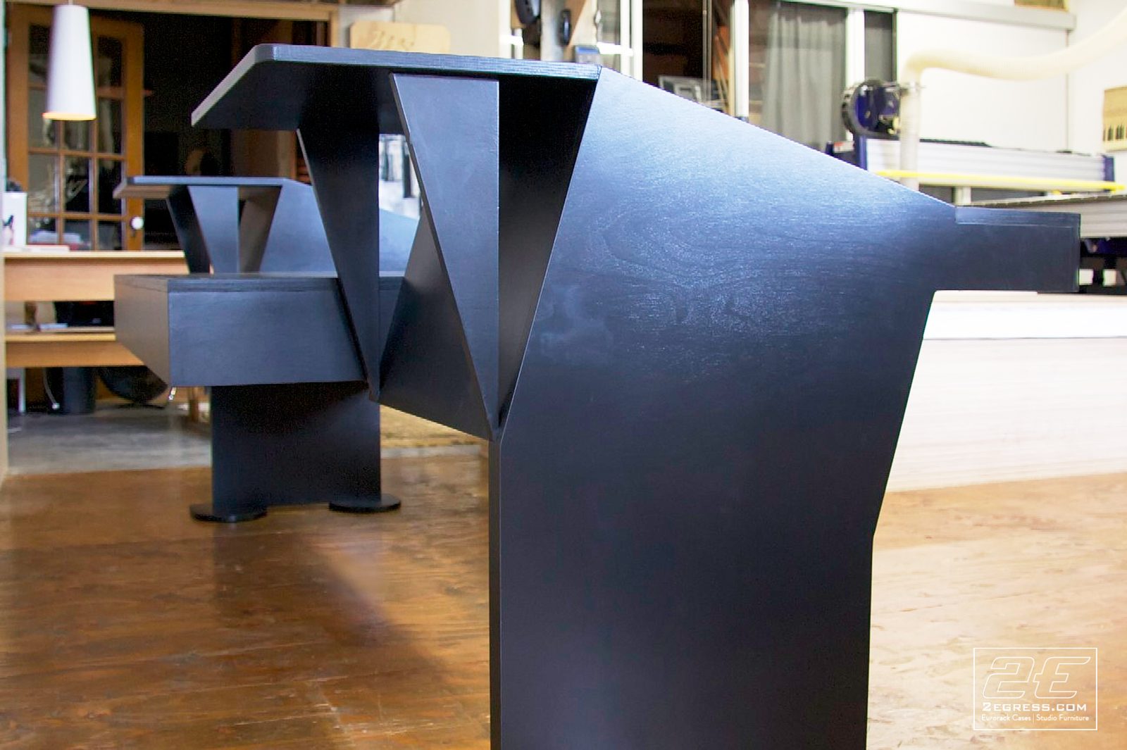 Stealth for Avid System 5 desk | close detail of the angled leg support structure | 2Egress