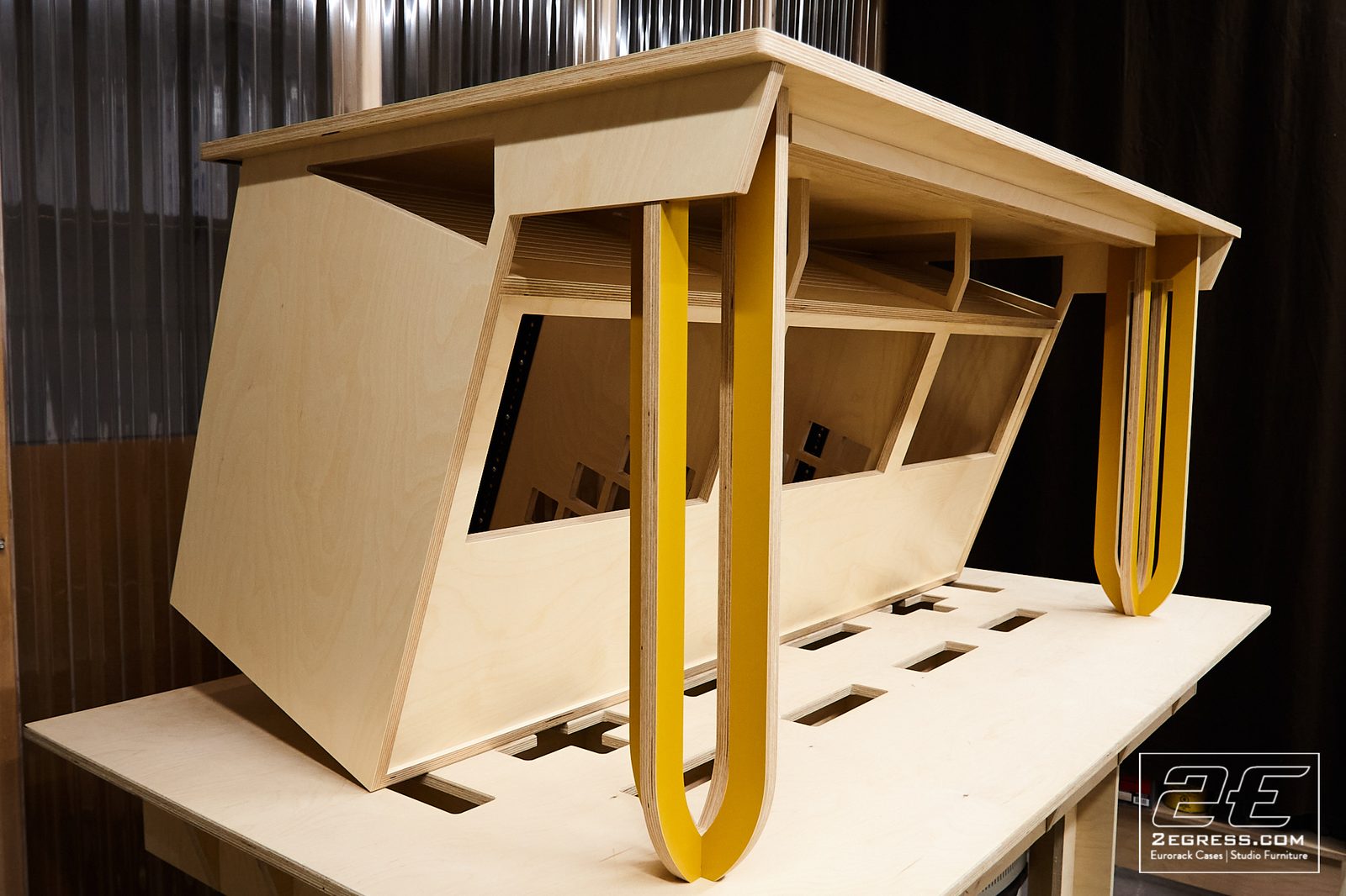 Stinger rack desk | three-quarter view with yellow legs | 2Egress