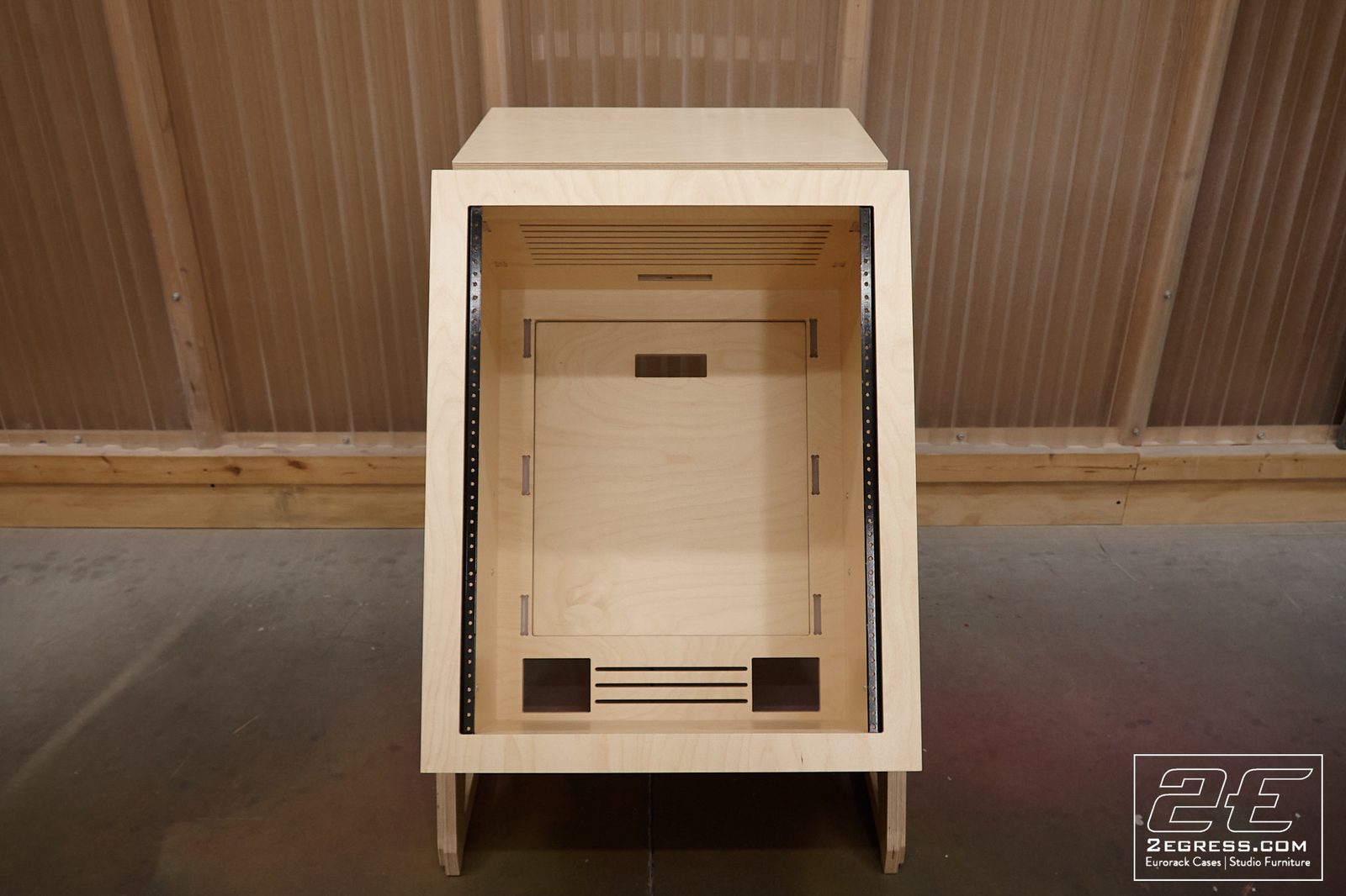 Voyager I studio rack | front view, magnetic door removed, rack rails and ventilation slots visible | 2Egress