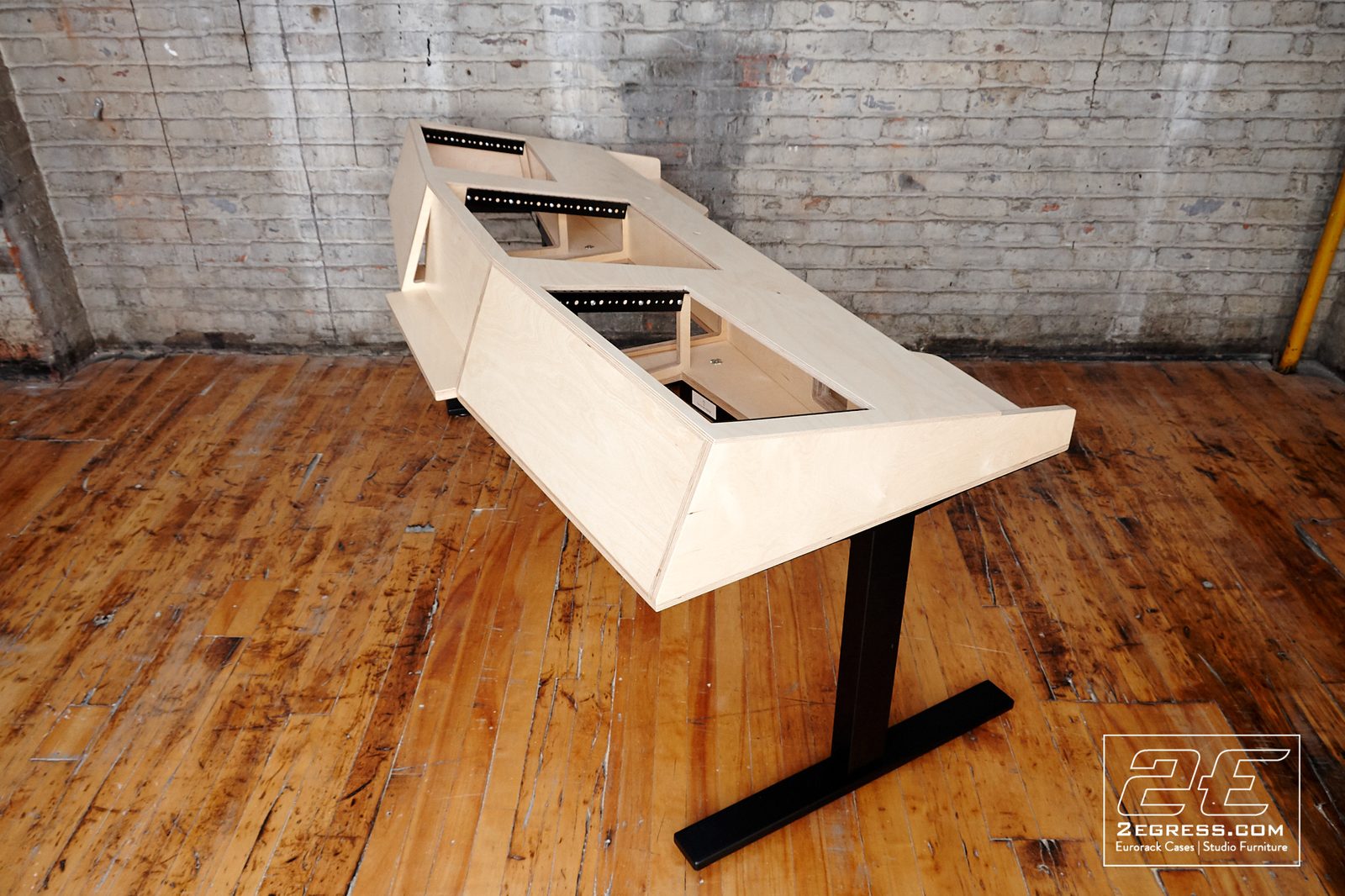 VTOL studio desk | angled underside view, raw construction | 2Egress