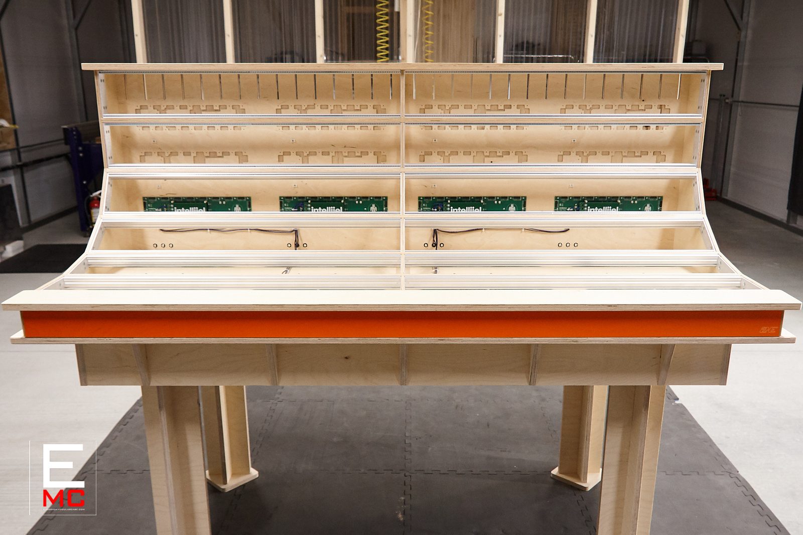 18U Phoenix eurorack case | Front view, empty case with orange accent trim and Intellijel busboards | EurorackModularCase