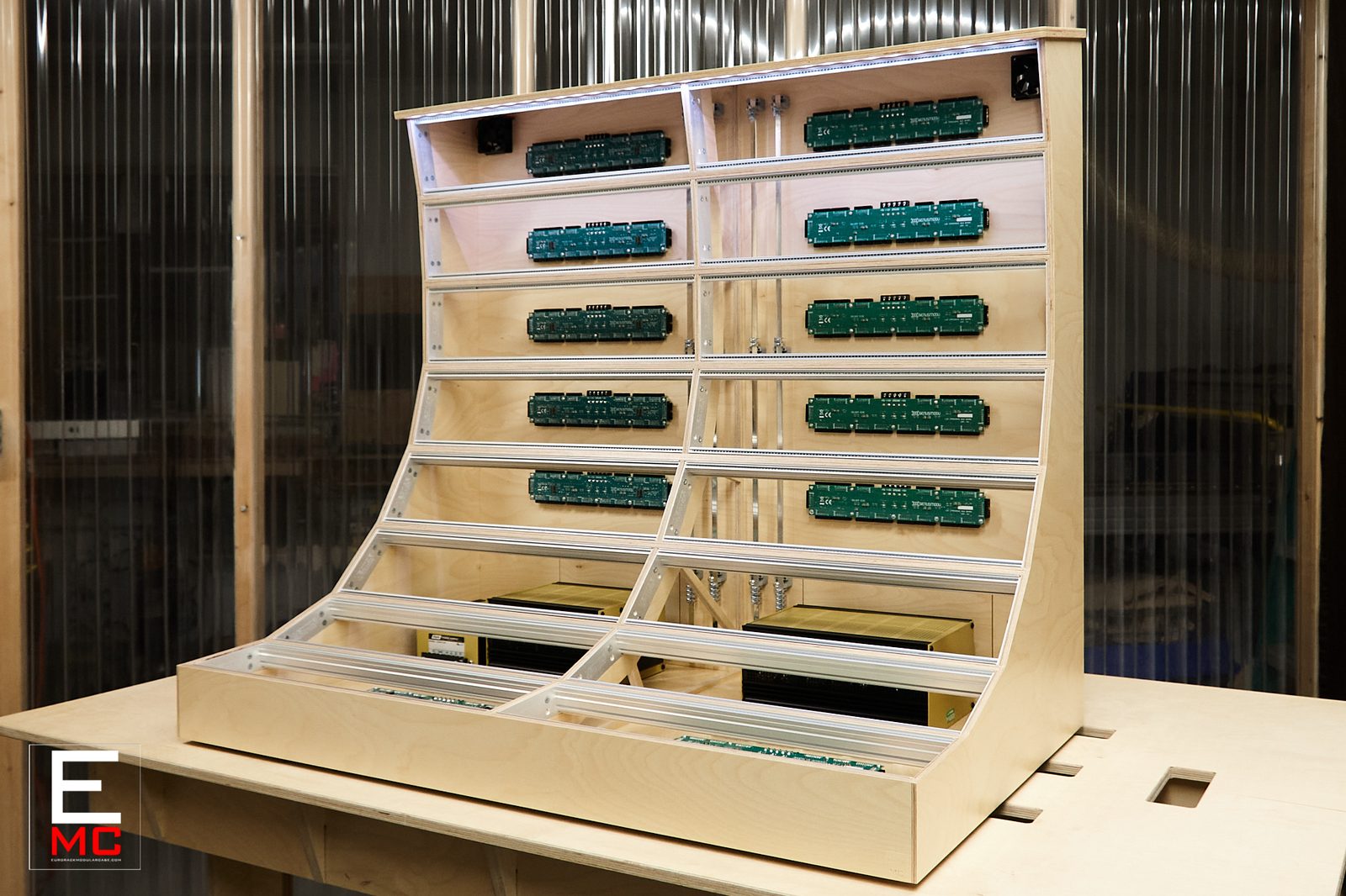 24U Barnstormer eurorack case | Rear panel showing the mounting hole grid, dual cooling fans and IEC inlets | EurorackModularCase