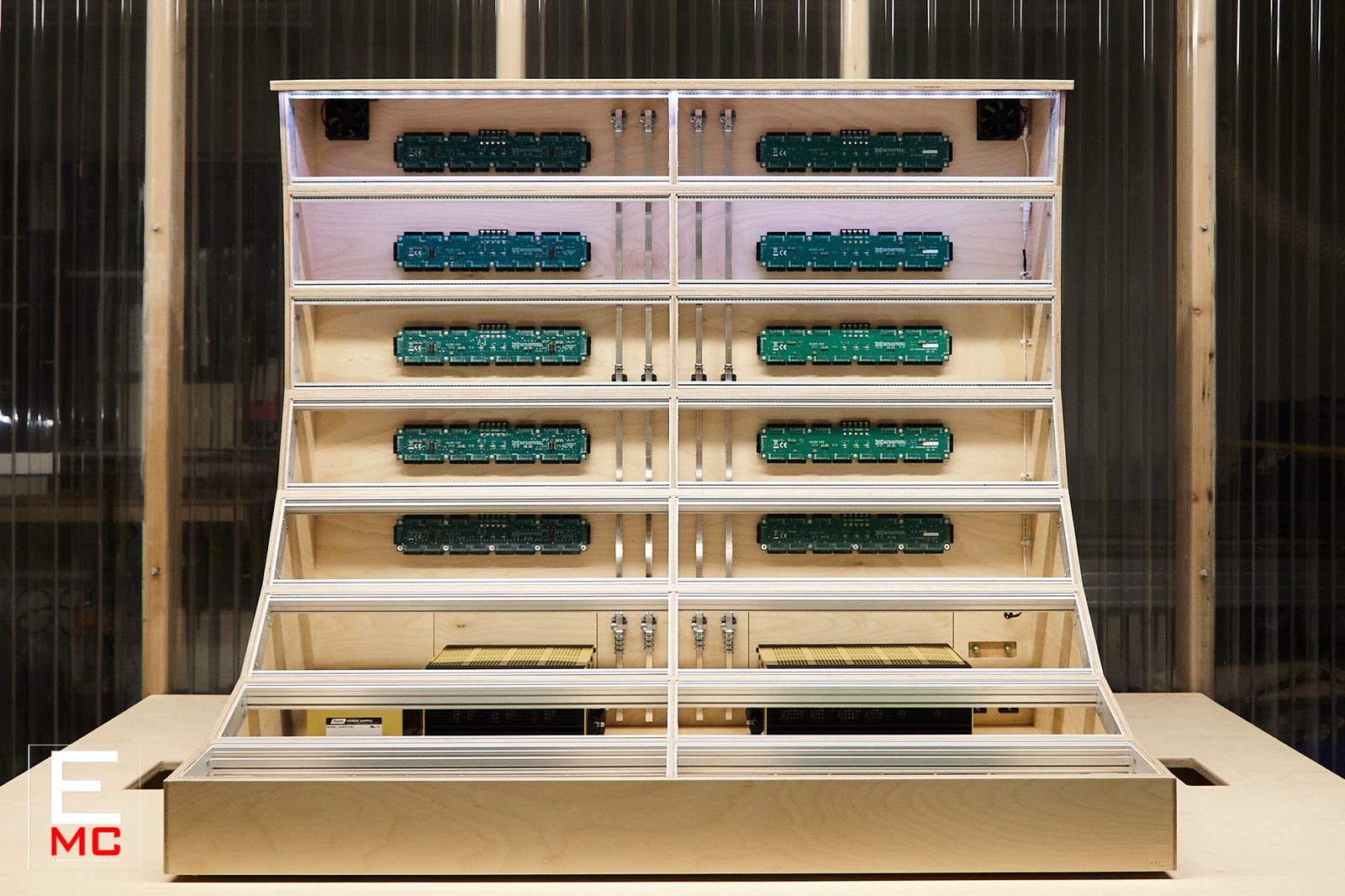 24U Barnstormer eurorack case | Front view under bright white lighting, fully populated with busboards | EurorackModularCase