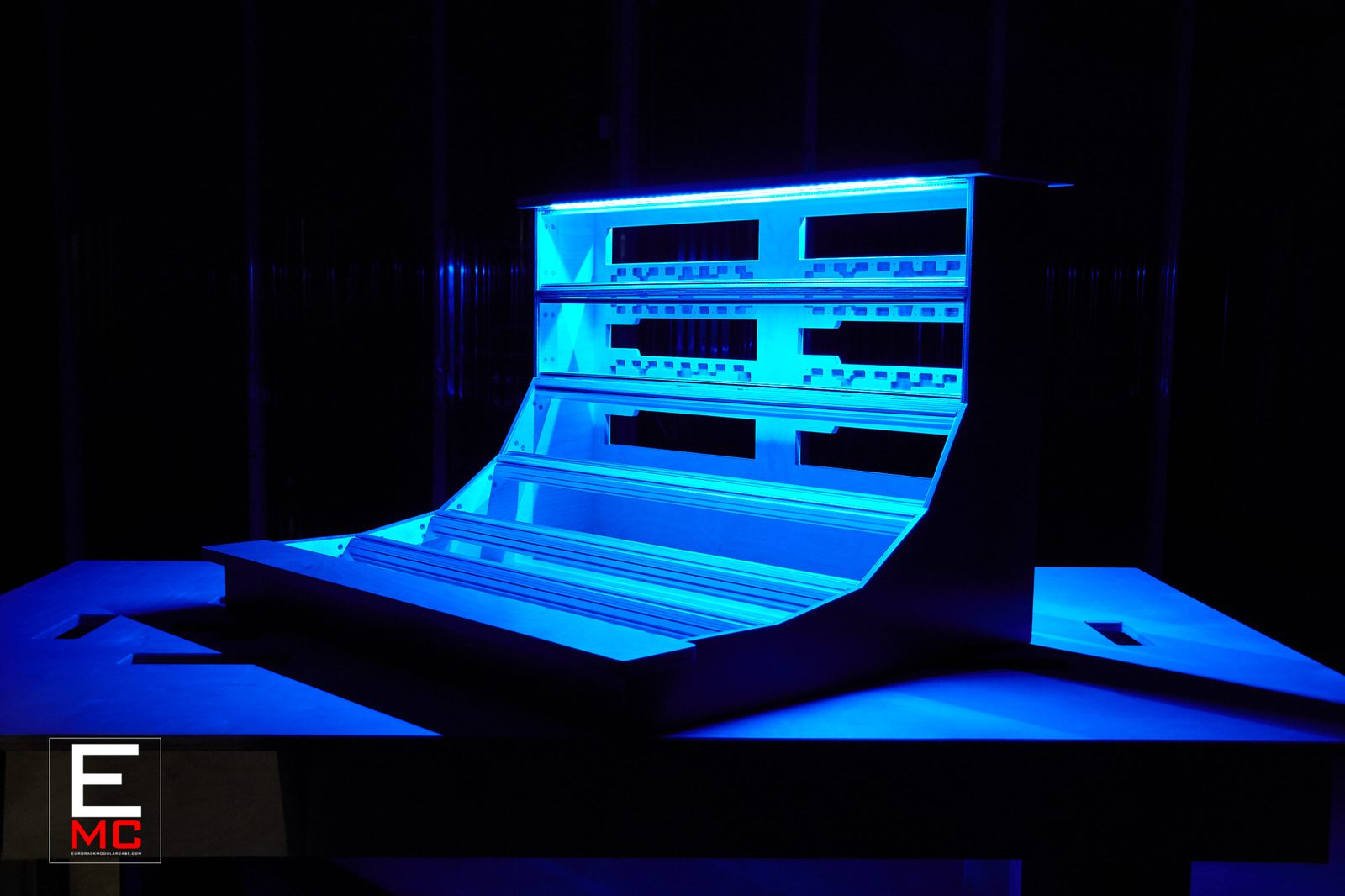 Benn Jordan | 18U 'The Blue' case lit in dramatic blue light, empty rack rails visible | Studio Egregia