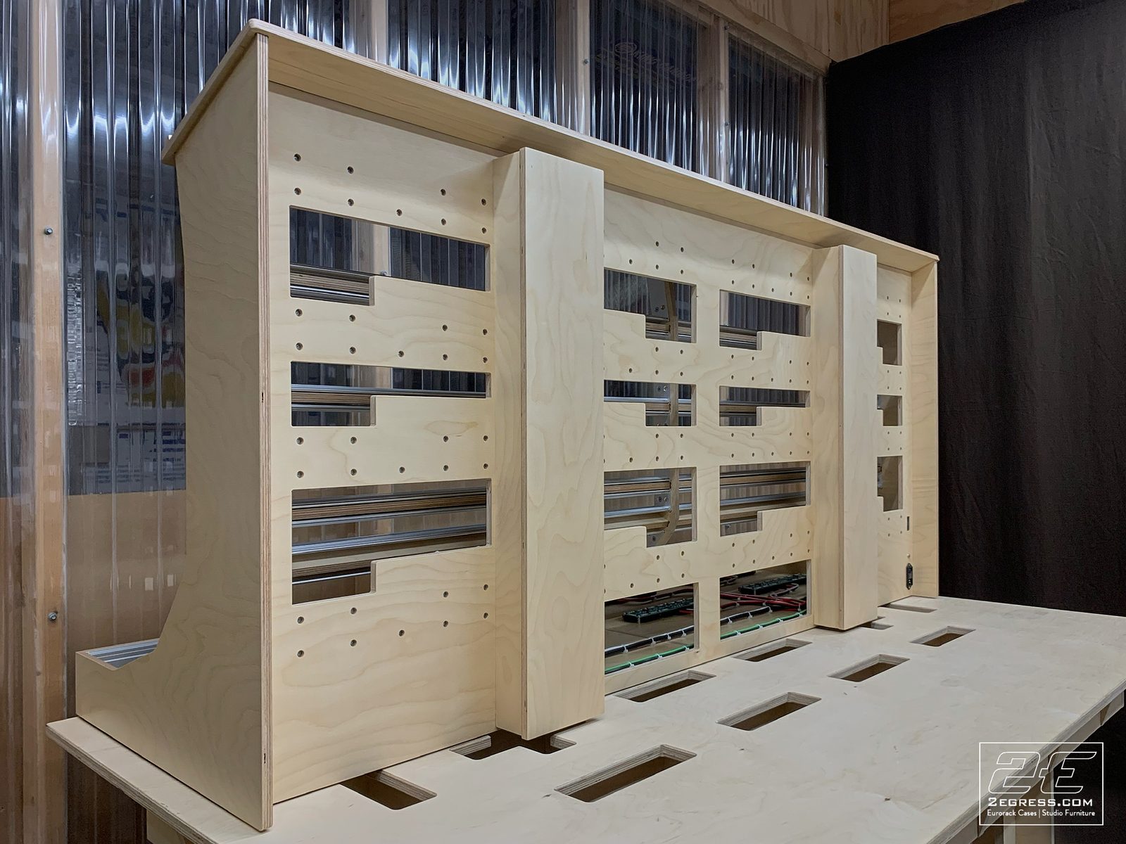 Jamie Lidell | Rear view of the 19U case laid flat, showing internal rail construction and screw pattern | Studio Egregia