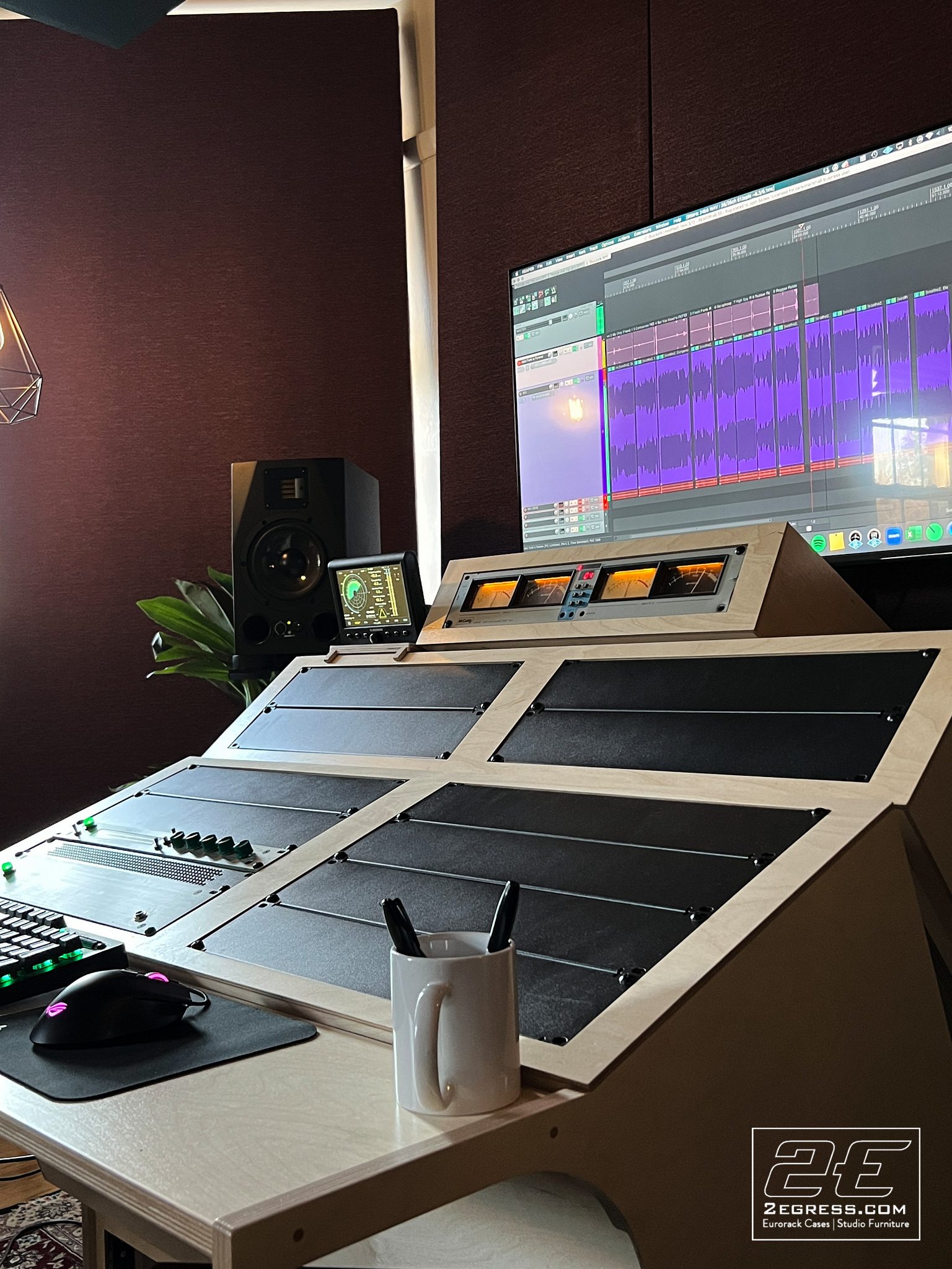Josh Sebek | Close-up of the finished Lotus desk's McCurdy VU meters and REAPER session on the studio monitor | Studio Egregia