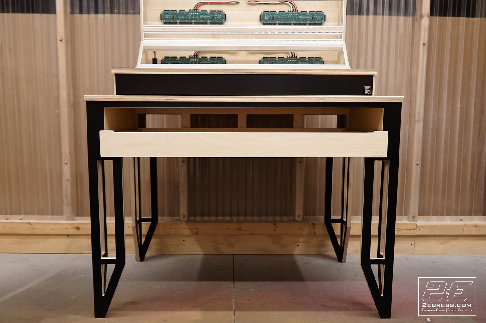 Nate Lueck | Front view of case and drawer with rear-panel circuit boards visible above | Studio Egregia