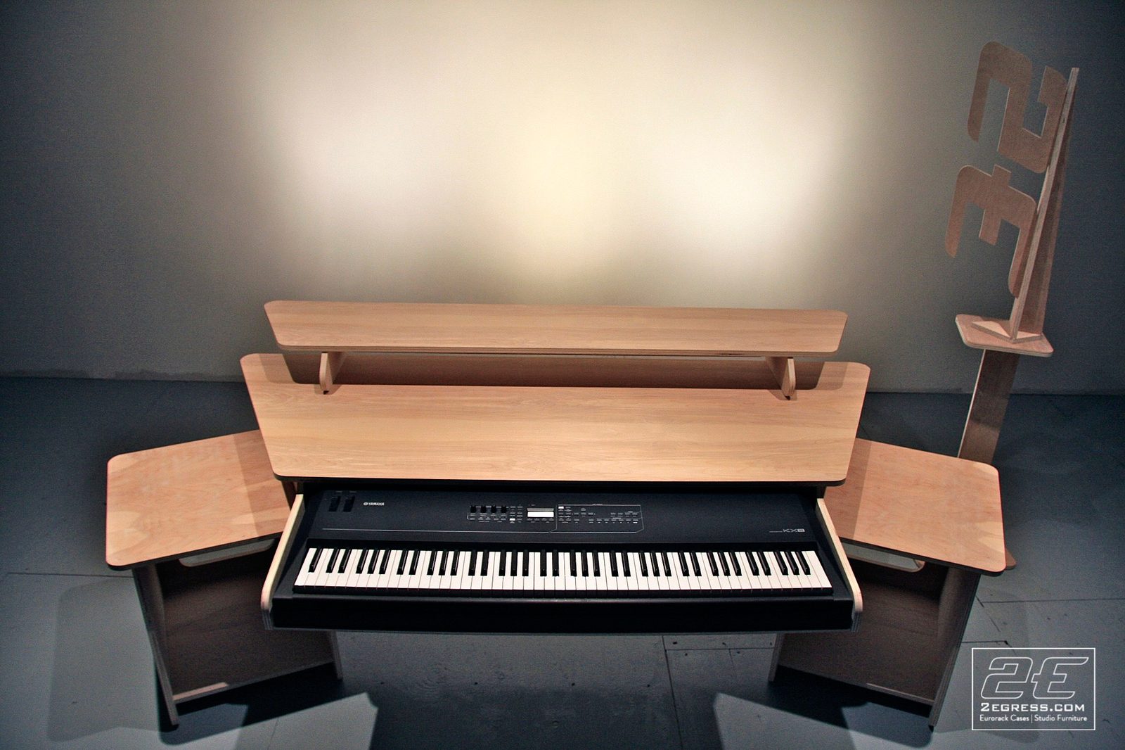 Simon Poole | Front view of the finished Vee desk with the Yamaha KX8 keyboard centered | Studio Egregia